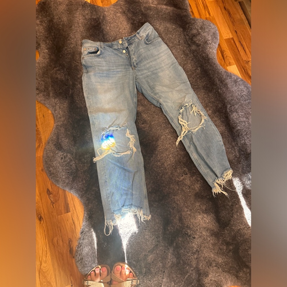 Free People light wash, distressed jeans. Size 28. Wide leg.